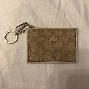 Coach ID and change holder